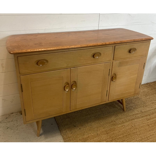 1 - An Ercol sideboard model 351 on short splayed legs (H82cm W123cm D46cm)