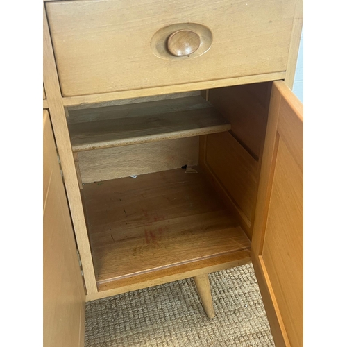 1 - An Ercol sideboard model 351 on short splayed legs (H82cm W123cm D46cm)