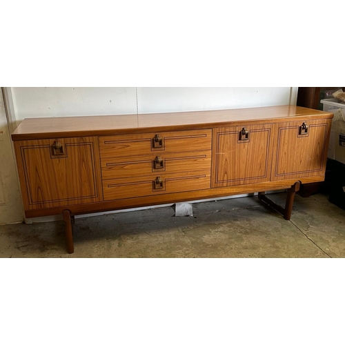 10 - A Mid Century sideboard with string inlay and drop handles (H73cm W184cm D46cm)