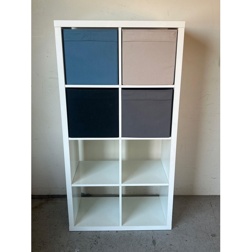 101 - An Ikea storage cupboard with four coloured boxes (H147cm W77cm D39cm)