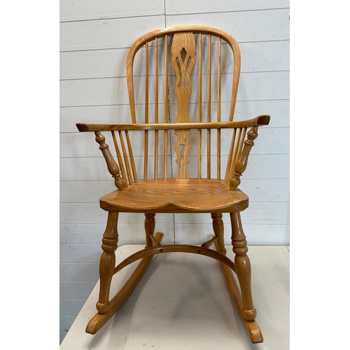 11 - A pine high back Windsor rocking chair