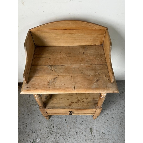 110 - A pine washstand with galleried top (H96cm W61cm D44cm)