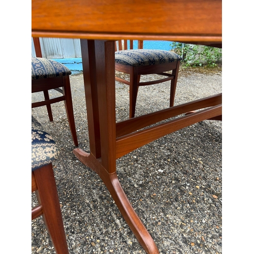 113 - A Stag dining table and six chairs (H73cm W170cm D100cm)