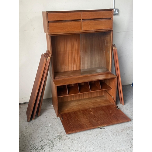 115 - A modular Danish teak wall system, comprising of three units and shelves