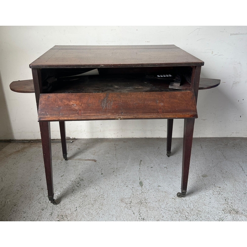 119 - A mahogany desk on tapering legs (H84cm W84cm D62cm)