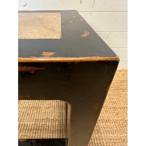 139 - A black hardwood geometric side table with polished stone insert to top (H49cm SQ49cm)