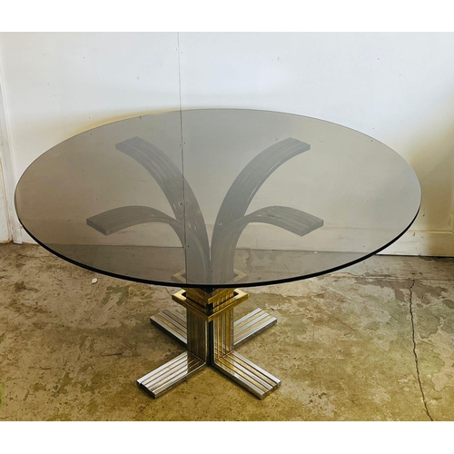 14 - A vintage circular glass dining table on a chrome base and brass by Banci and Fireaze (H72cm Dia130c... 