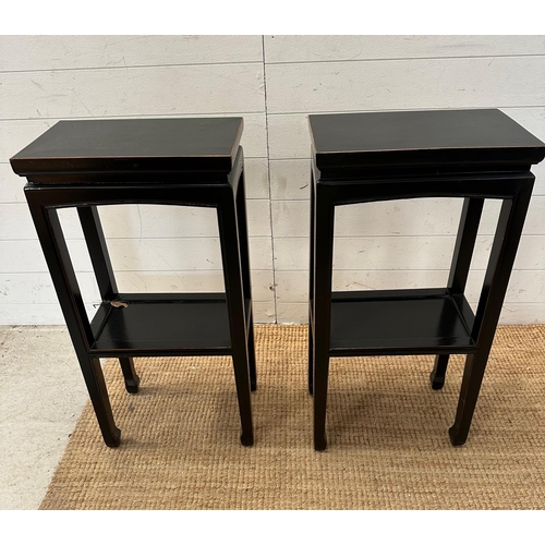 140 - A pair of black Chinese style accent side tables with shelves under (H80cm W40cm D24cm)