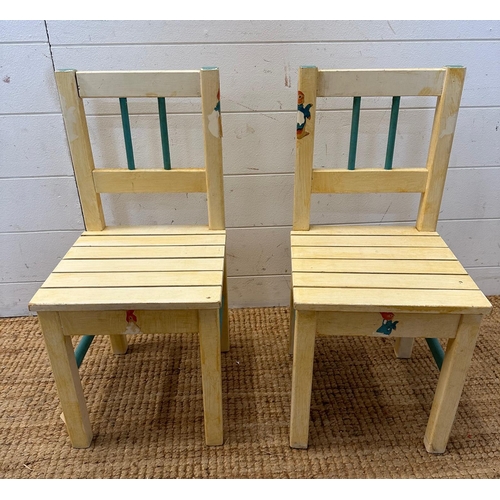 150 - Two Peter Rabbit themed child's nursery chairs, white painted with blue spindle backs (SH29cm)