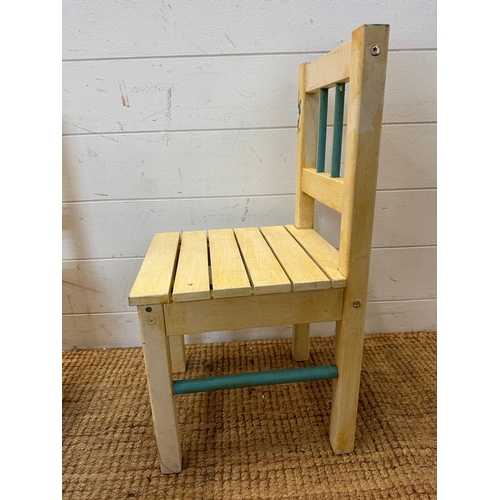 150 - Two Peter Rabbit themed child's nursery chairs, white painted with blue spindle backs (SH29cm)