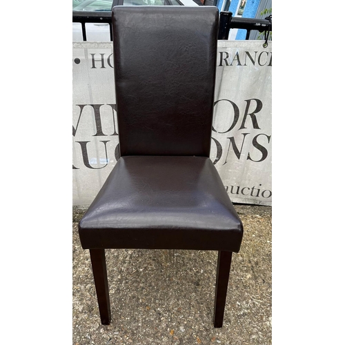 152 - Eleven faux leather dining chairs