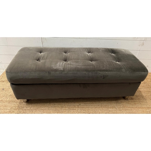 155 - A velvet ottoman with button back detail (H42cm W117cm D46cm)