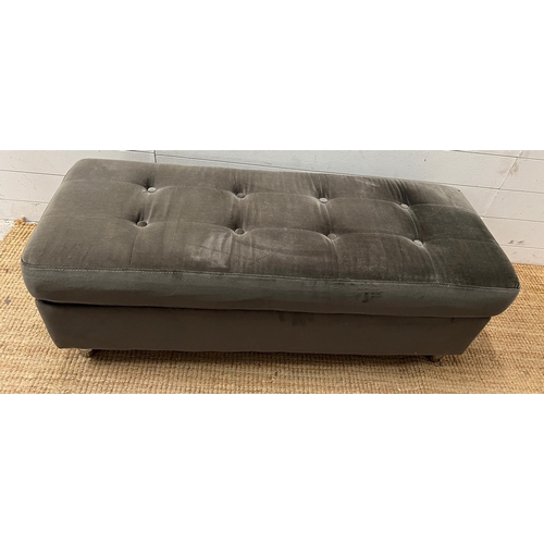 155 - A velvet ottoman with button back detail (H42cm W117cm D46cm)