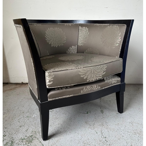 167 - An Art Deco style tub chair, black framed and upholstered in a silver and grey floral upholstery