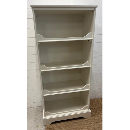 170 - A white painted three shelf bookcase or shelving unit (H154cm W71cm D34cm)