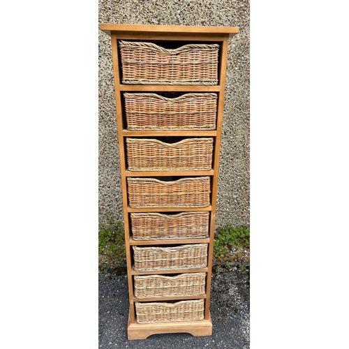 172 - Eight wicker drawer tall boy (H143cm W45cm D42cm)