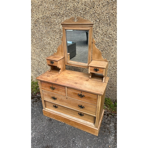 178 - A pine dressing table with mirror back