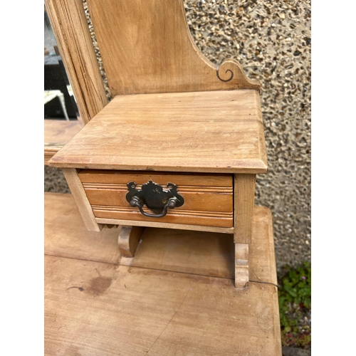 178 - A pine dressing table with mirror back