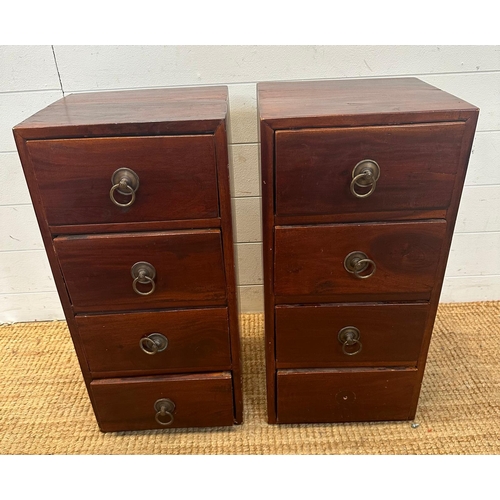 41 - A pair of four drawer Indonesian hardwood bedside table (H62cm W30cm D30cm)