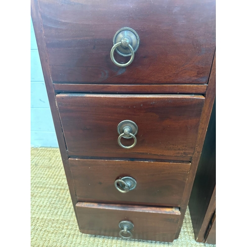 41 - A pair of four drawer Indonesian hardwood bedside table (H62cm W30cm D30cm)