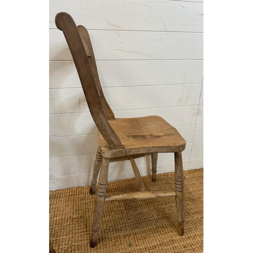 42 - A pair of distressed pine shelf back kitchen chairs on turned legs AF