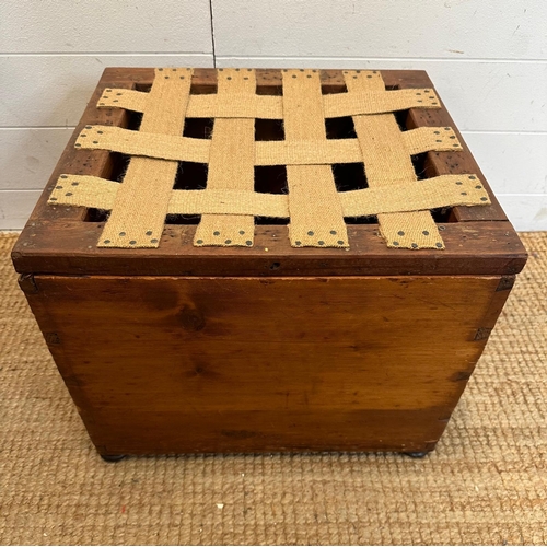 46 - A pine storage box or stool with webbed hessian seat and brass drop handles to side (H37cm W46cm D40... 