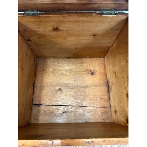 46 - A pine storage box or stool with webbed hessian seat and brass drop handles to side (H37cm W46cm D40... 