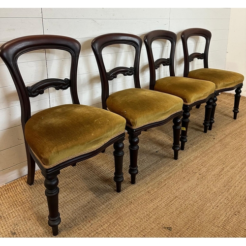 48 - A set of four mahogany Victorian dining chairs upholstered in green