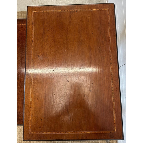 54 - A nest of two mahogany side tables with inlaid tops