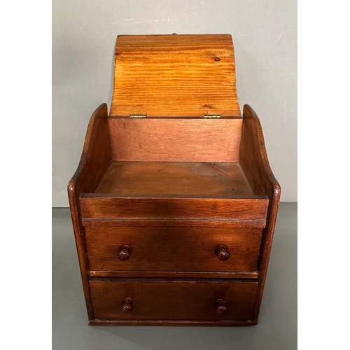 56 - A vintage mahogany two drawer desk tidy in the form of a bureau (H31cm W28cm D24cm)