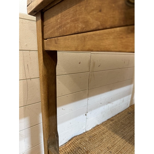 57 - A rustic pine kitchen table with single drawer to end (Height 77x74x121)