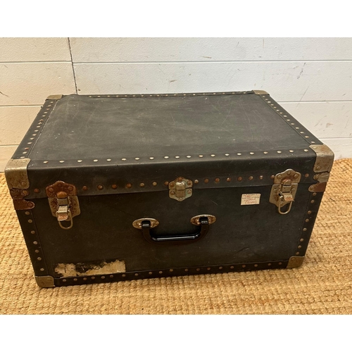 61 - A vintage blue travel trunk with metal corners, studded detail and central handle (28cm x 58cm x 38c... 