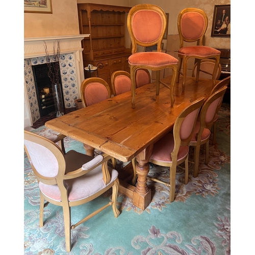 64 - A pine dining table with ten chairs (H75cm W244cm D91cm)