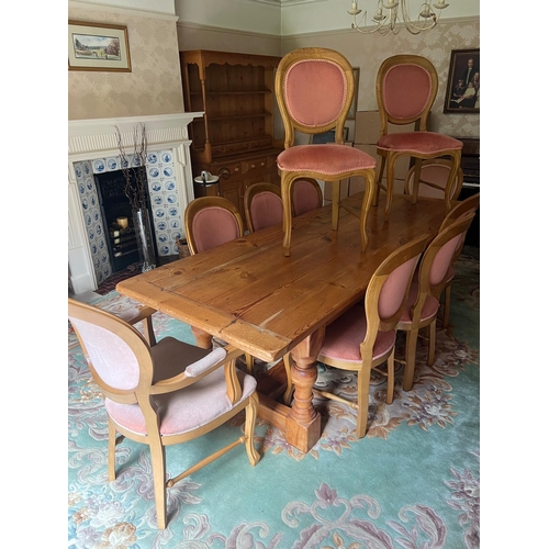 64 - A pine dining table with ten chairs (H75cm W244cm D91cm)