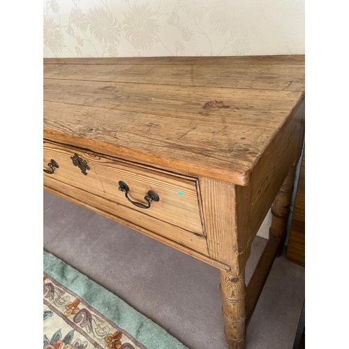 66 - A pine console table with three long drawers (H79cm W227cm D53cm)