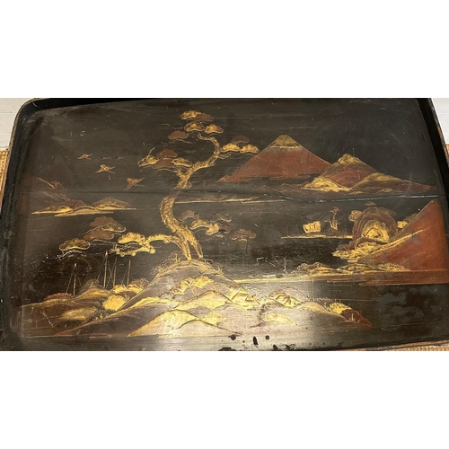 7 - A vintage Japanese butlers tray, black lacquered and with a hand painted gilt scene depicting mount ... 