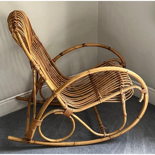 74 - A wicker/cane rocking chair (98cm x 57cm)