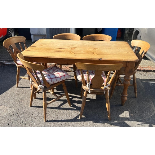 78 - A pine kitchen table with six chairs (H77cm W150cm D79cm)