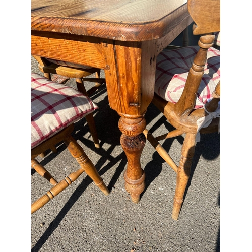 78 - A pine kitchen table with six chairs (H77cm W150cm D79cm)