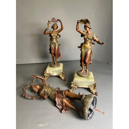 780 - Three spelter sculptures, two on onyx stands H39cm