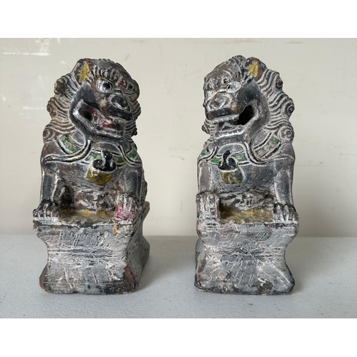 782 - A pair of stone Chinese foo dog statues or bookends