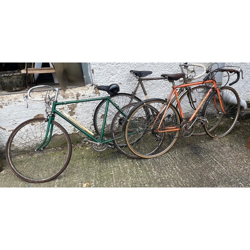 784 - Three vintage bikes including a Peugeot