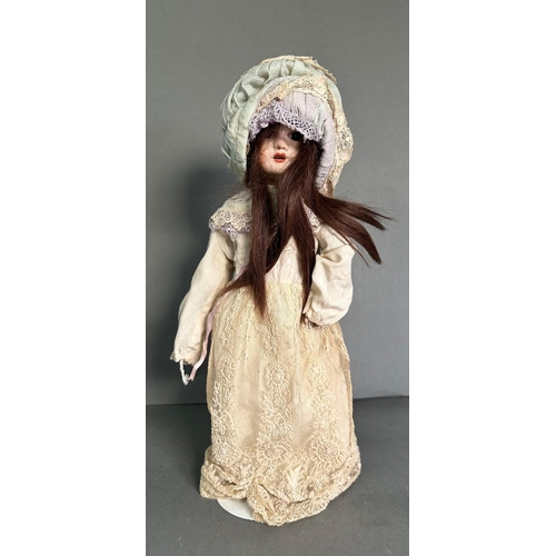 786 - A vintage porcelain doll