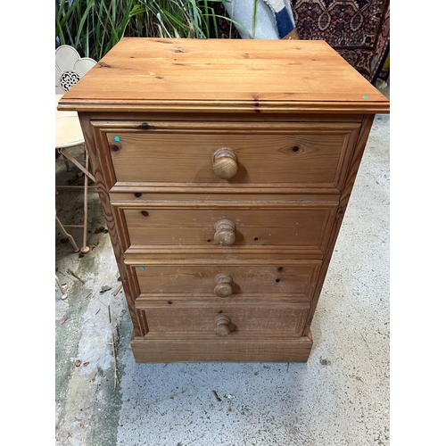 83 - A pine two drawer filing cabinet or deep drawer with a faux drawer front