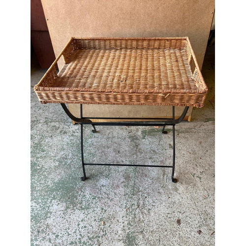 87 - A wicker butler tray on stand