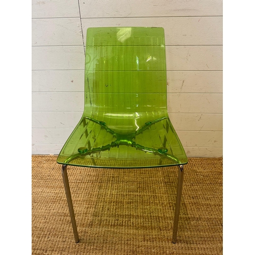 90 - Three Frovi coloured perspex chairs with chrome frames, two green and one orange