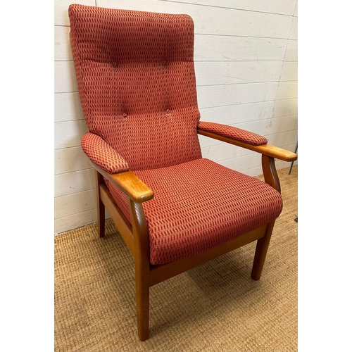 92 - A Mid Century Clinique arm chair, teak and upholstered in a terracotta fabric