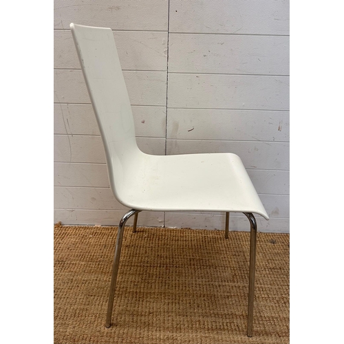 94 - Two white Italian Sintesi chairs on chrome legs