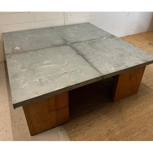 98 - A Terrence Conran industrial style zinc topped coffee table (H40cm W120cm D120cm)