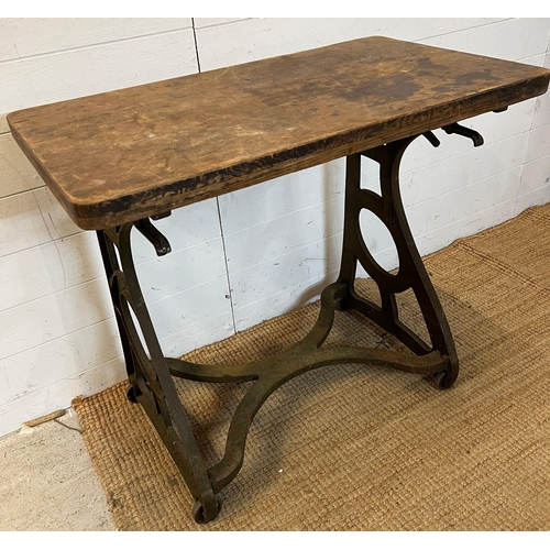 106 - A cast metal industrial table (H78cm W90cm D52cm)
